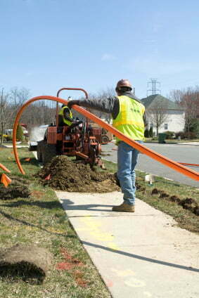 Cell tower fiber optic cable installation.