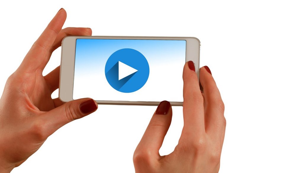 Image of cell phone with video playing
